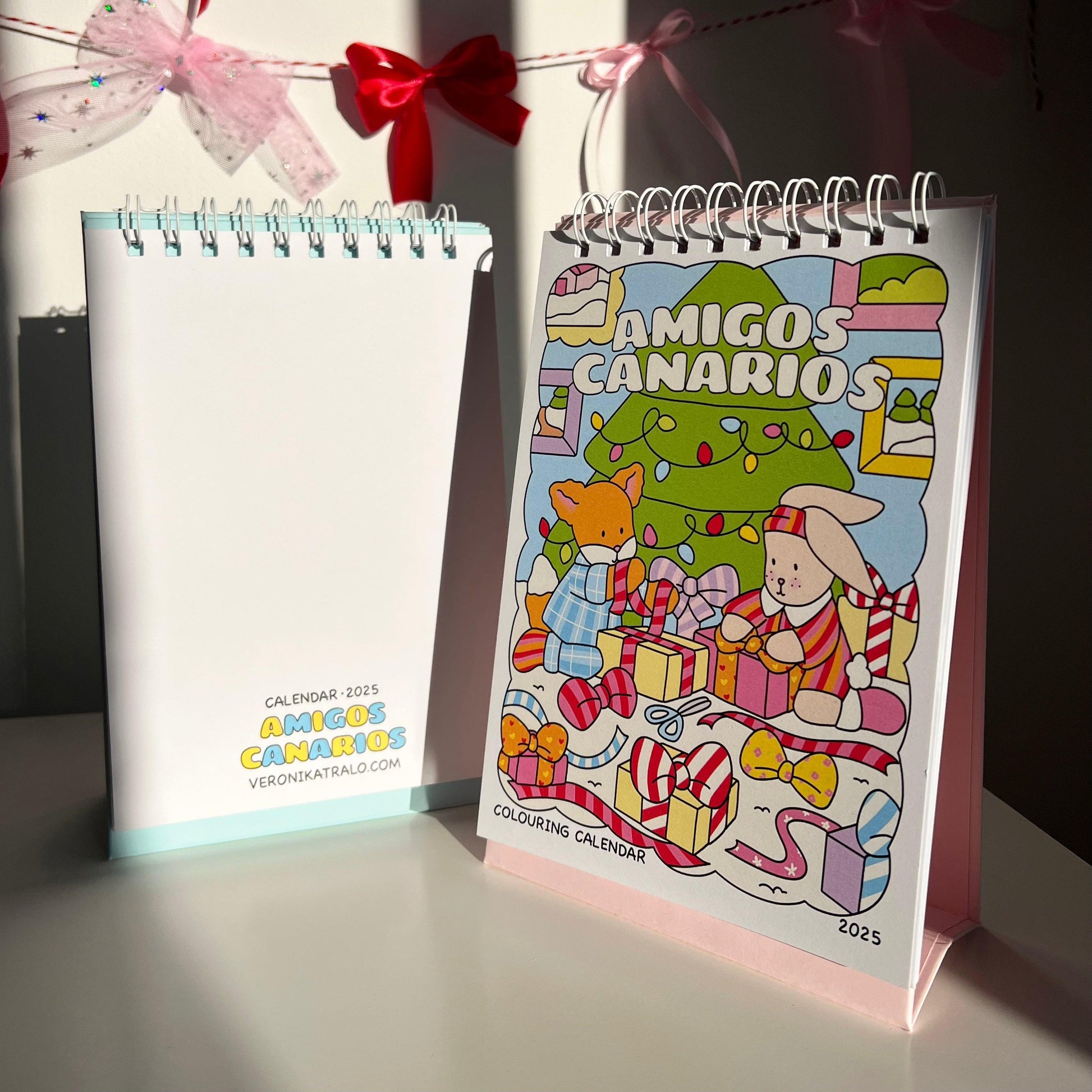 amigos canarios colouring calendar blue and pink
